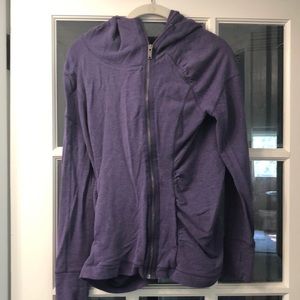 Cotton hoody with off-center zip.